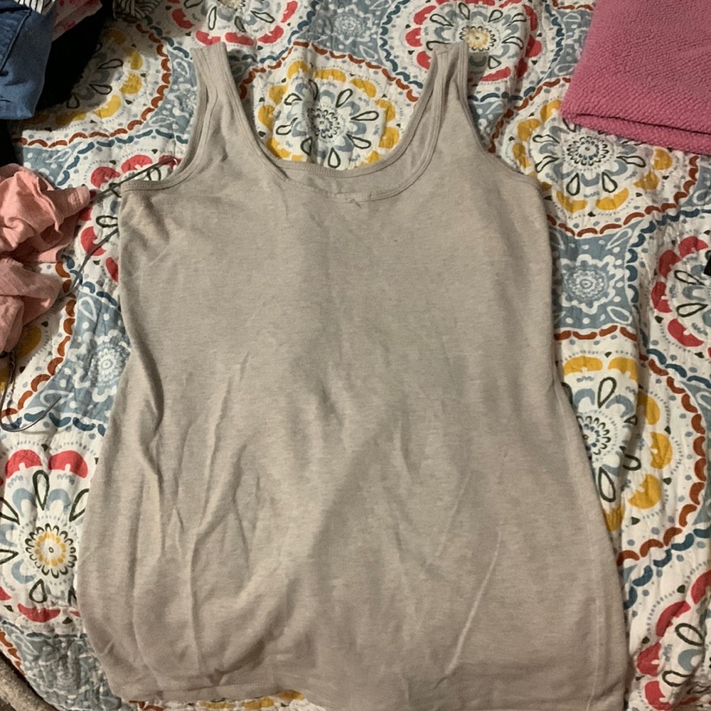 This is a cotton tan tank top. It is very comfy and is from Maurice’s